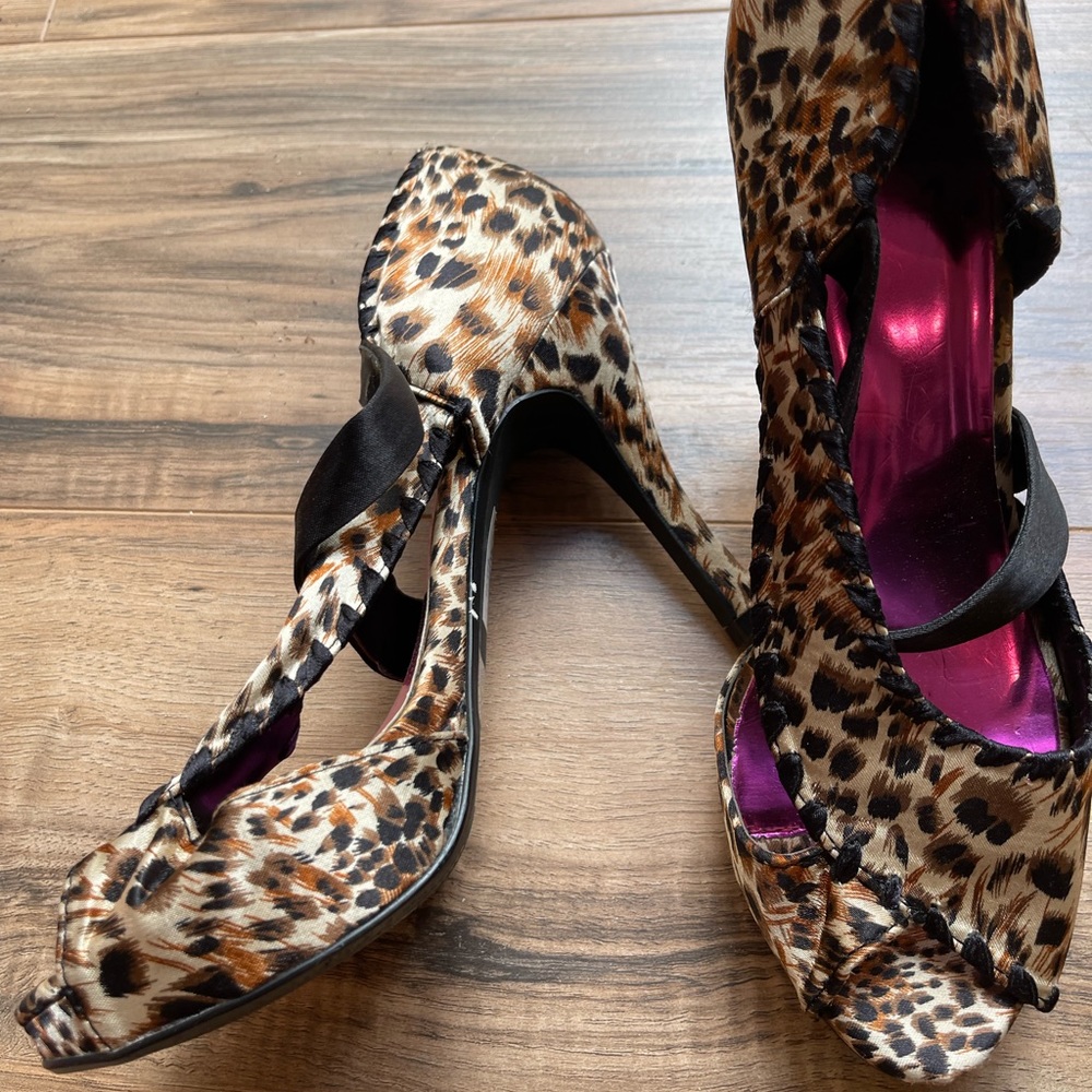 Buckle cheetah shoes.